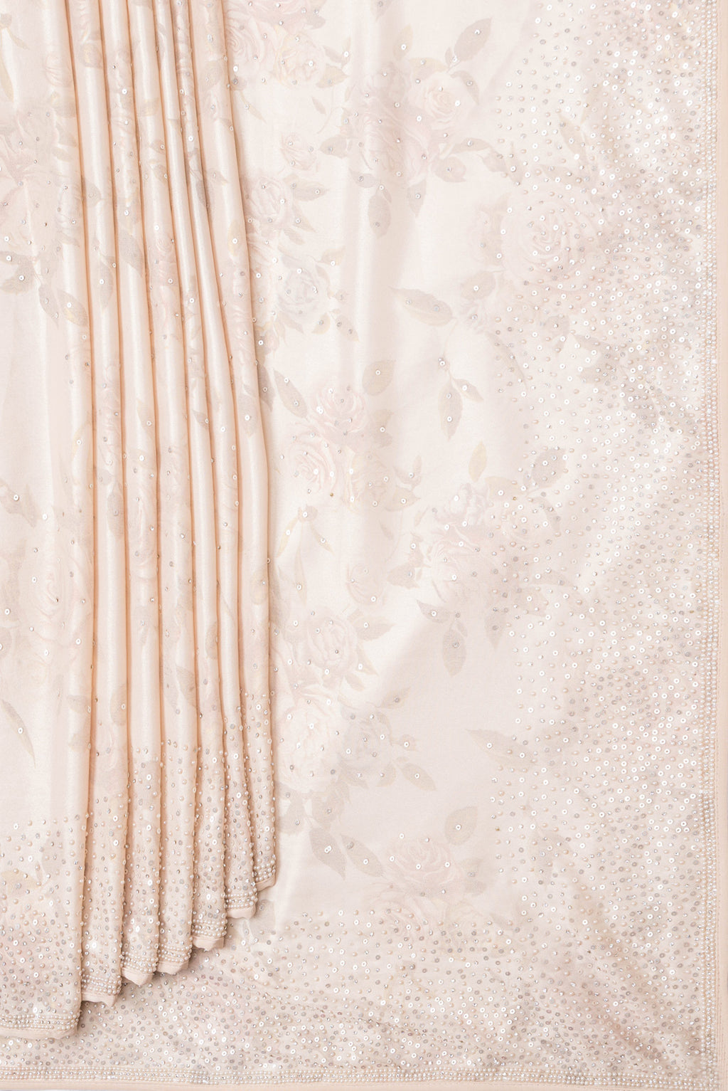 Pleats and pallu of Rose Gold Dual Tone Mysore Crepe Saree with Embroidery on the body and Embroidery Border. 