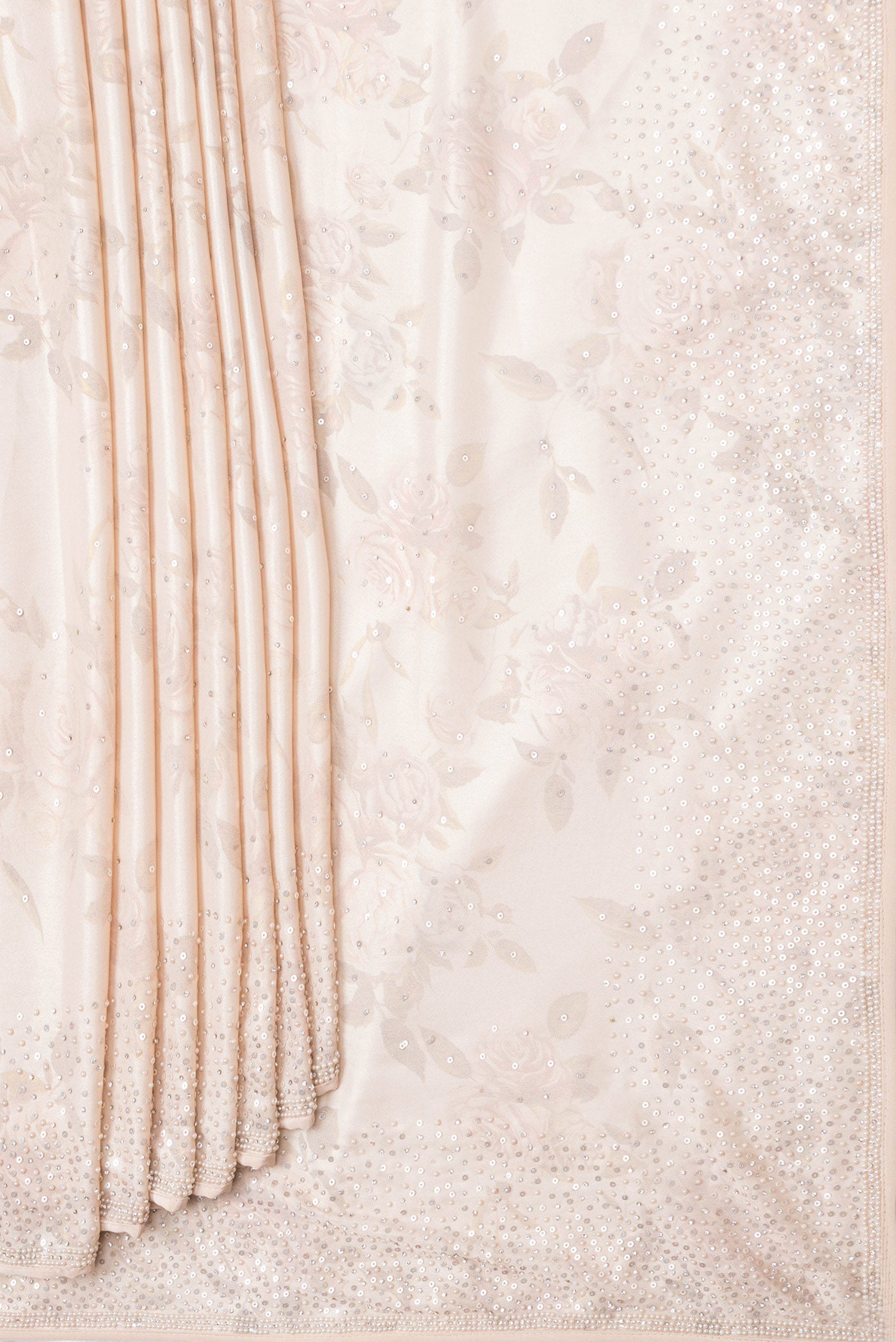 Pleats and pallu of Rose Gold Dual Tone Mysore Crepe Saree with Embroidery on the body and Embroidery Border. 