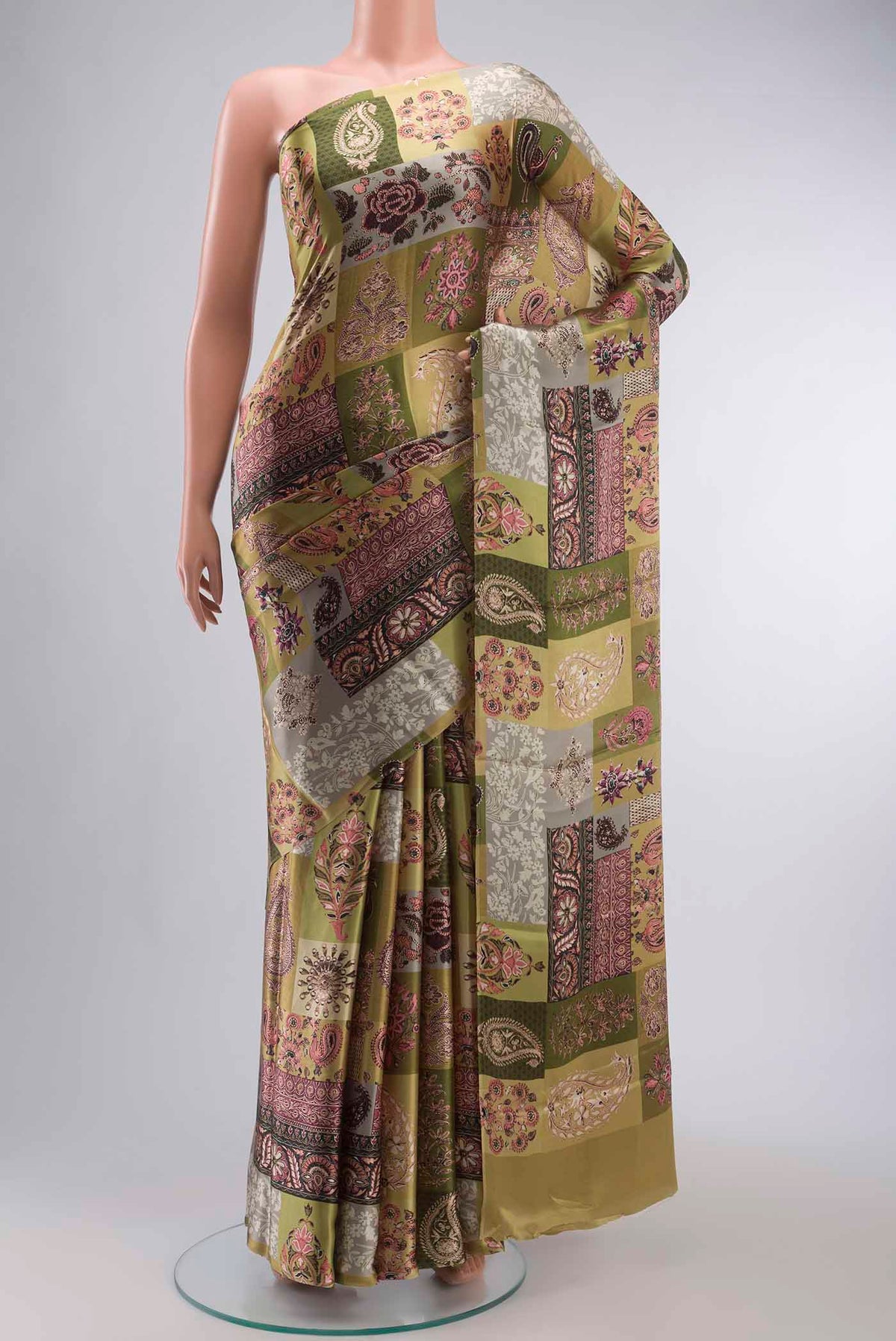 Green Satin Silk Saree with Printed design on the body and Without Border displayed on a mannequin