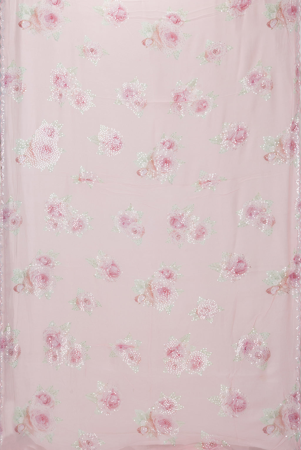 Flat view of Pink Georgette Saree with Embroidery on the body and Embroidery Border. 