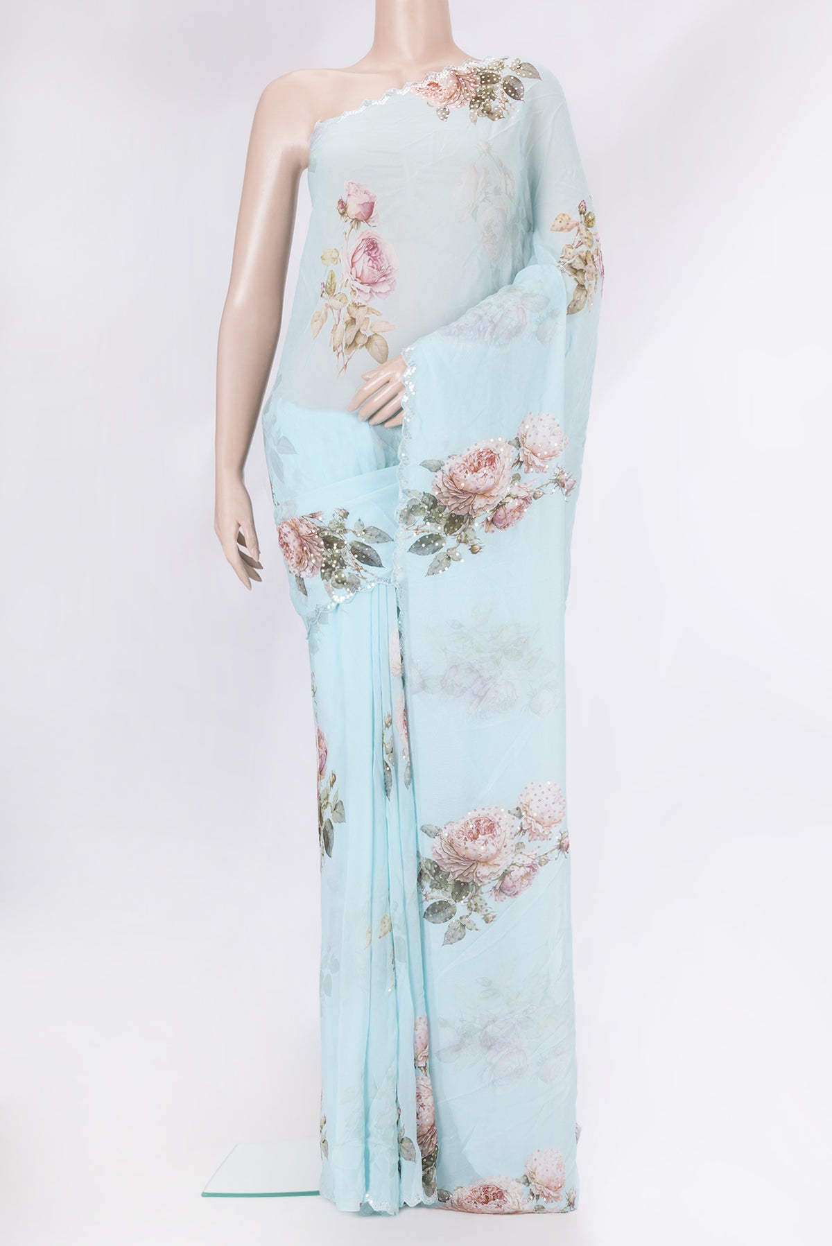 Sky Blue Dual Tone Georgette Saree with Embroidery on the body and Embroidery Border.  displayed on a mannequin
