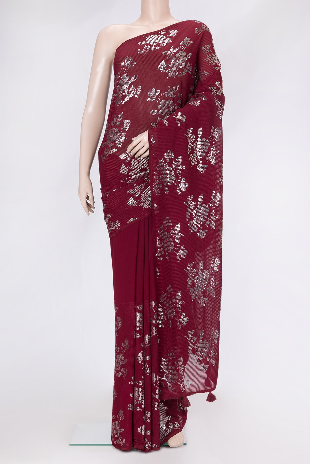 Maroon Dual Tone Mysore Georgette Saree with Embroidery on the body and Without Border.  displayed on a mannequin
