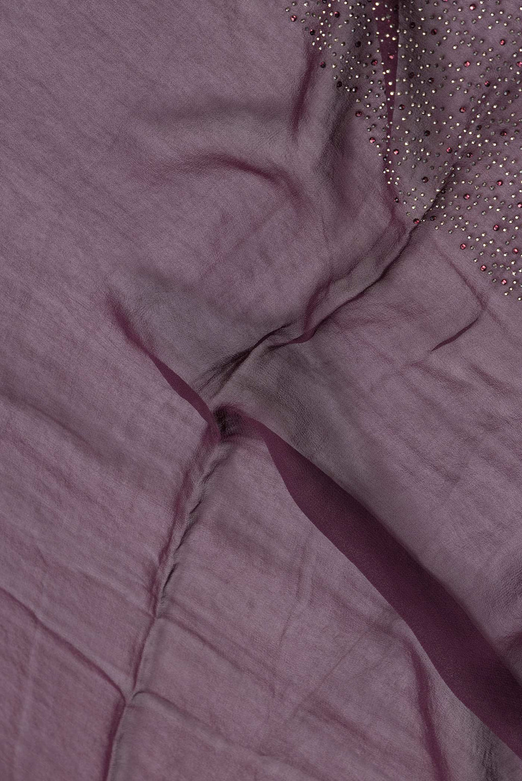 Close up of Burgundy Dual Tone Mysore Georgette Saree with Embroidery on the body and Sequin Border.  displaying folds