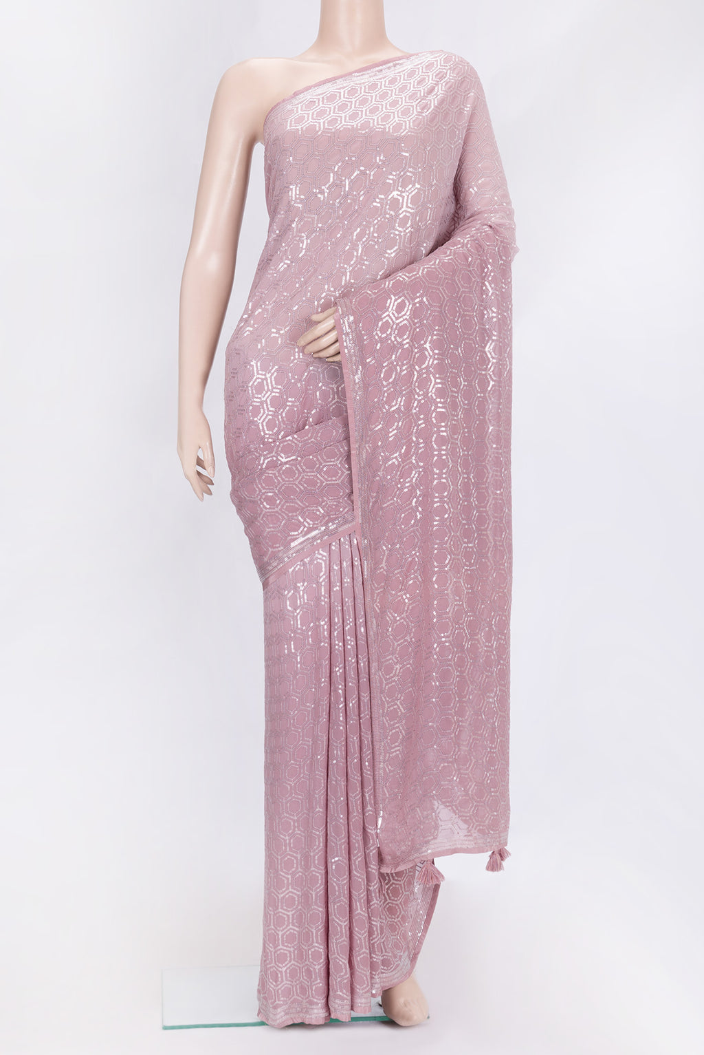 Rose Gold Dual Tone Georgette Saree with Embroidery on the body and Embroidery Border.  displayed on a mannequin