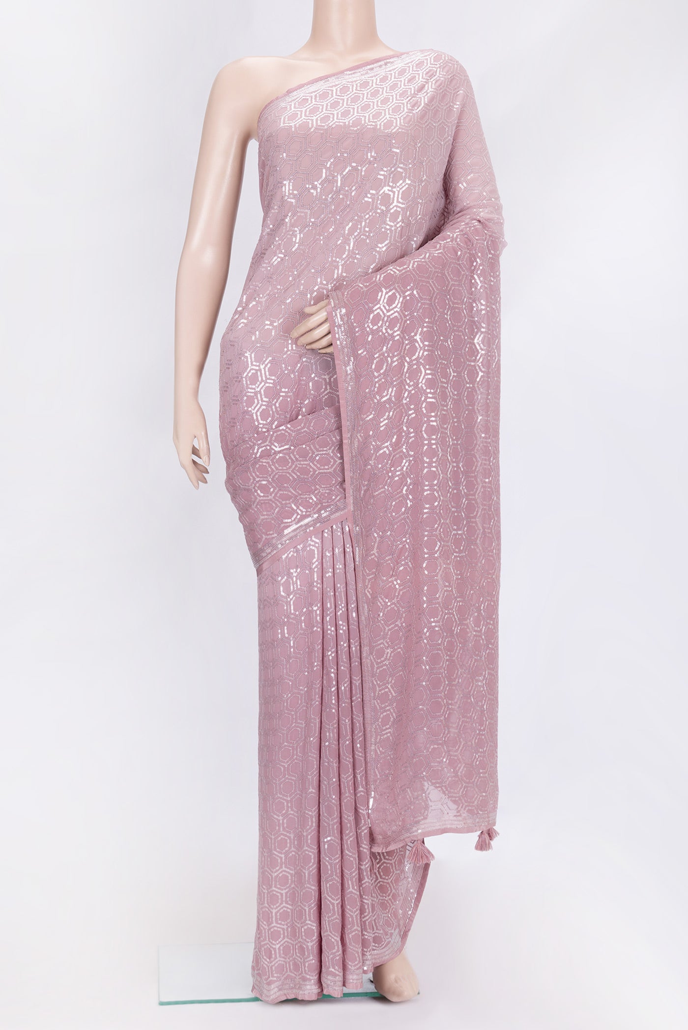 Rose Gold Dual Tone Georgette Saree with Embroidery on the body and Embroidery Border.  displayed on a mannequin