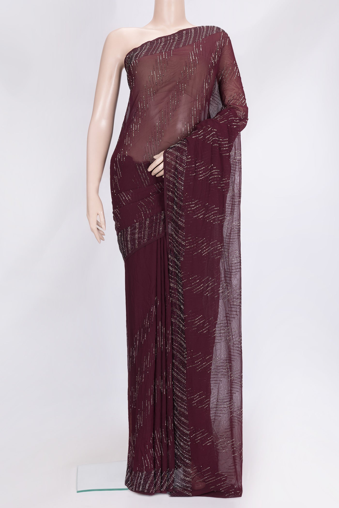Burgundy Dual Tone Georgette Saree with Embroidery on the body and Embroidery Border.  displayed on a mannequin