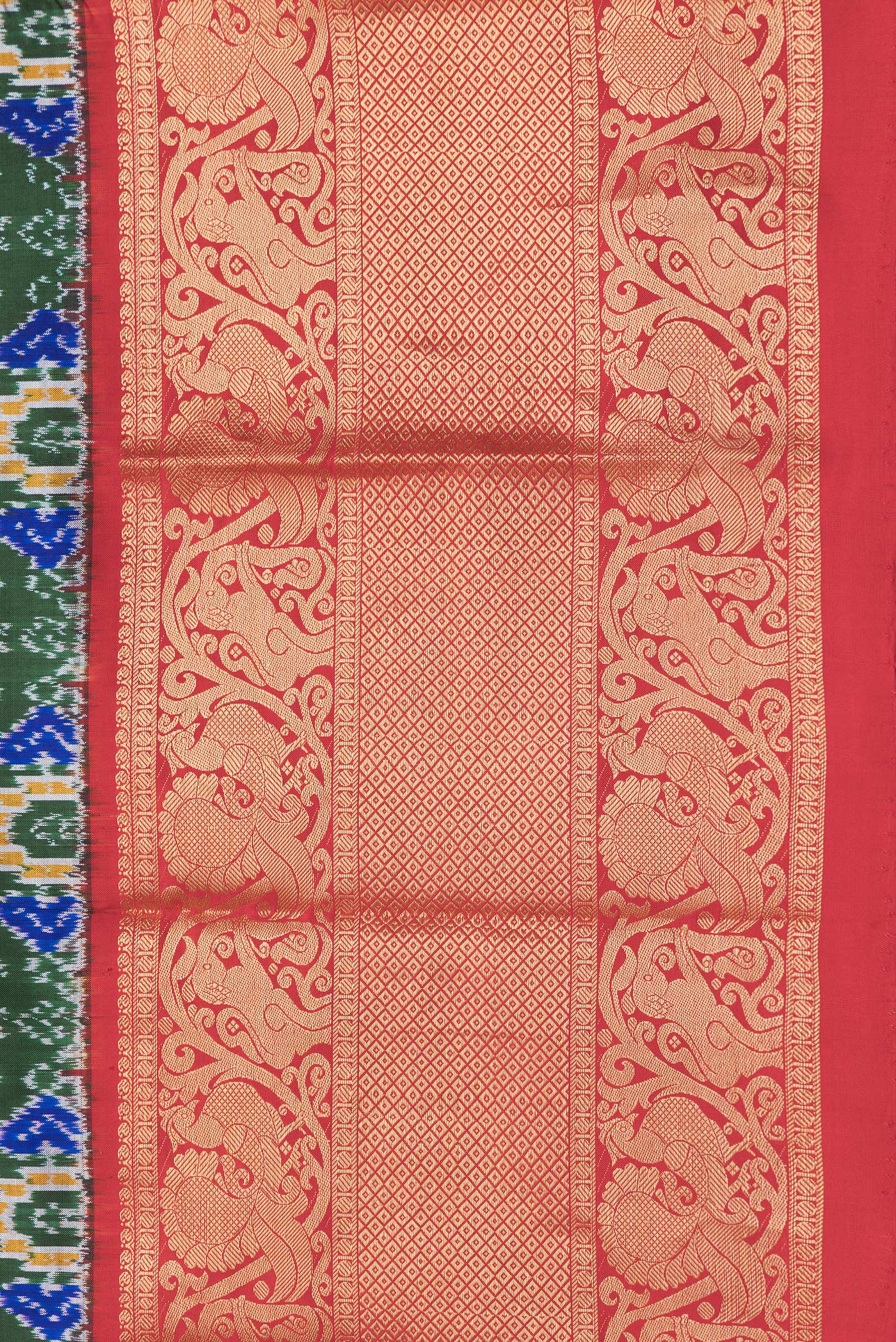 Border image of Bottle Green Dual Tone Kanchipuram Silk Saree with Ikat Print on the body and Zari Border. 