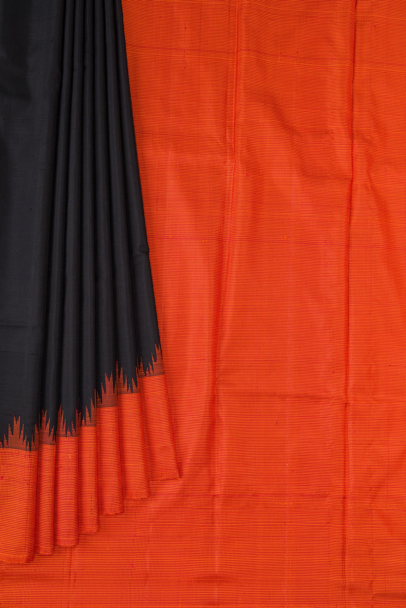 Pleats and pallu of Black Kanjivaram Silk Saree with Plain Body and Temple Border. 