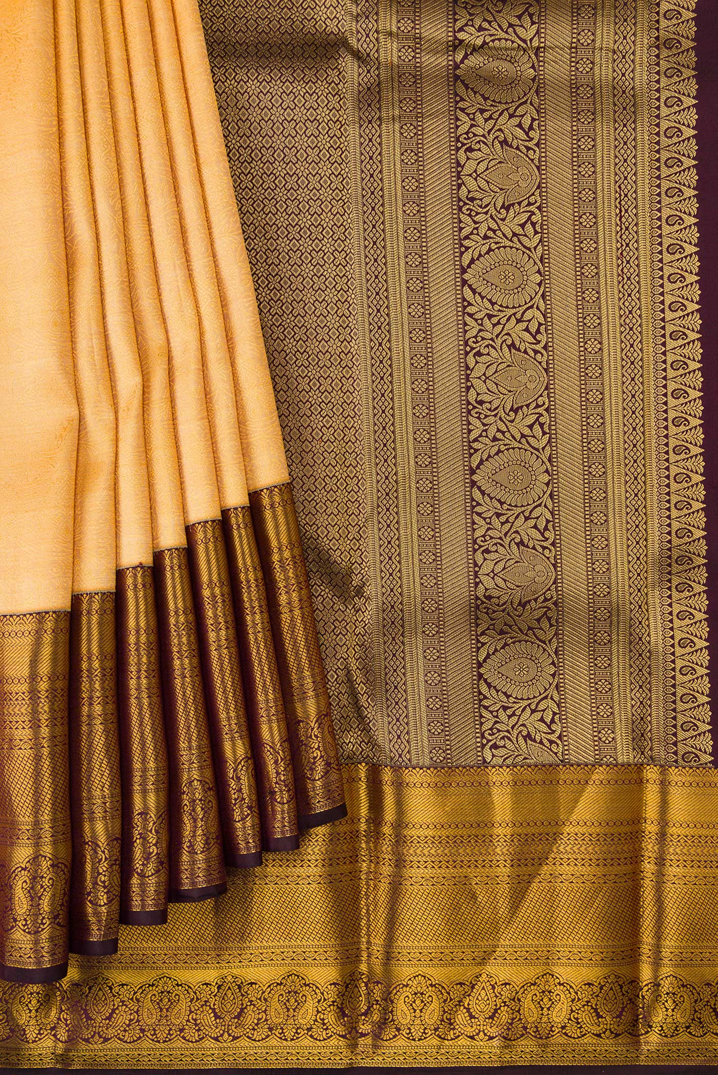 Pleats and pallu of Sandal Dual Tone Kanjivaram Silk Saree with Zari Brocade on the body and Zari Border. 