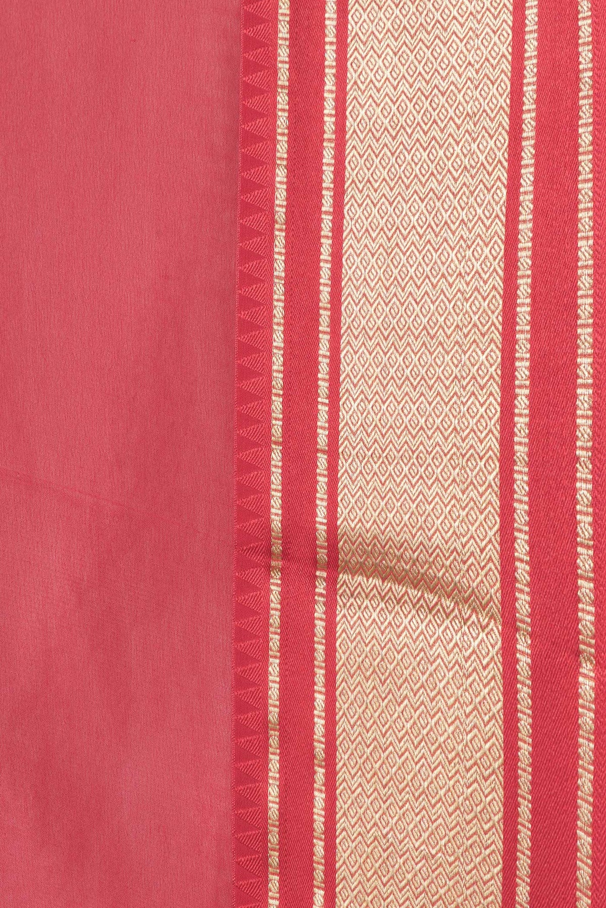 Border image of Red Dual Tone Georgette Saree with Plain Body and Zari Border. 