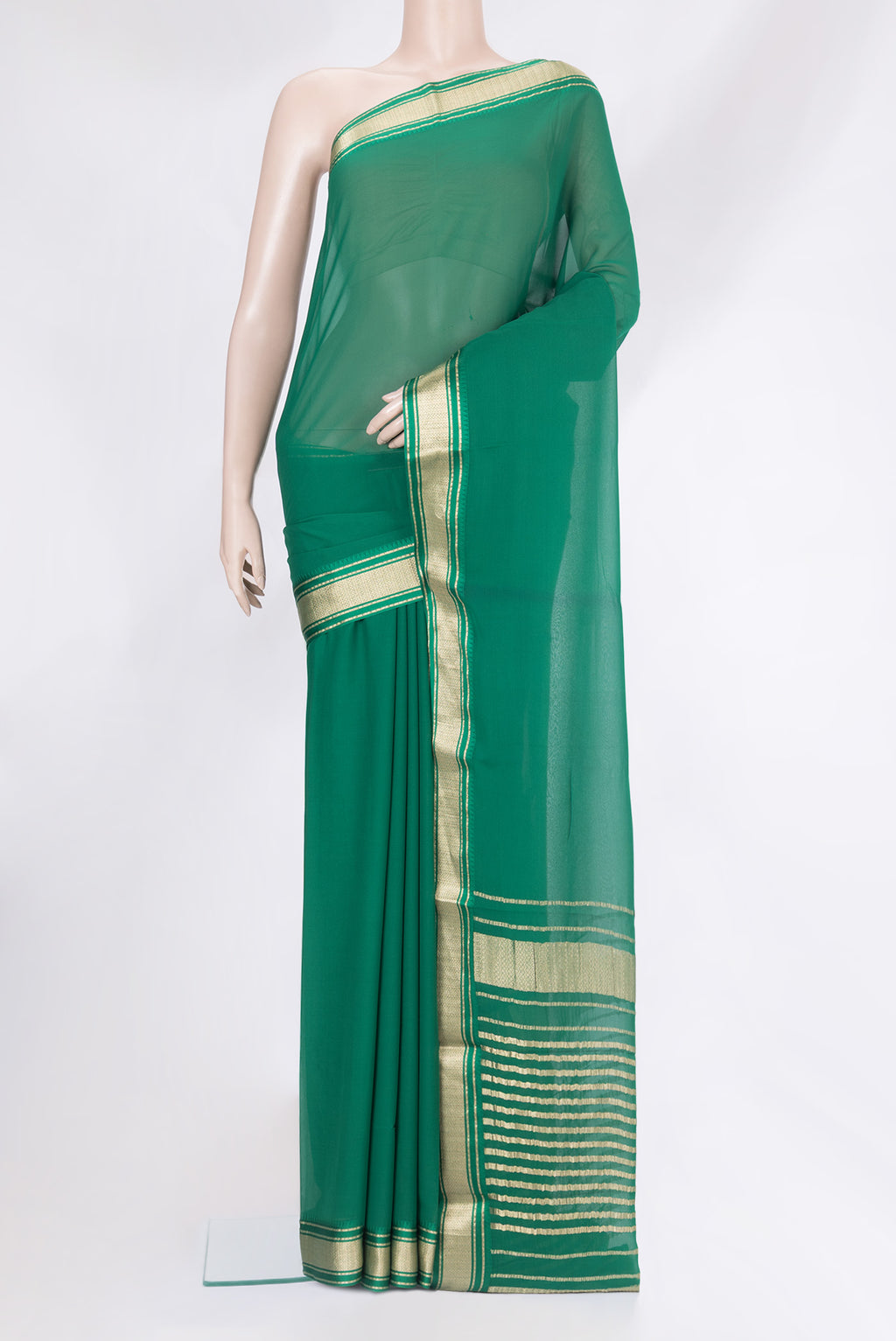 Green Mysore Georgette Saree with Plain Body and Zari Border.  displayed on a mannequin