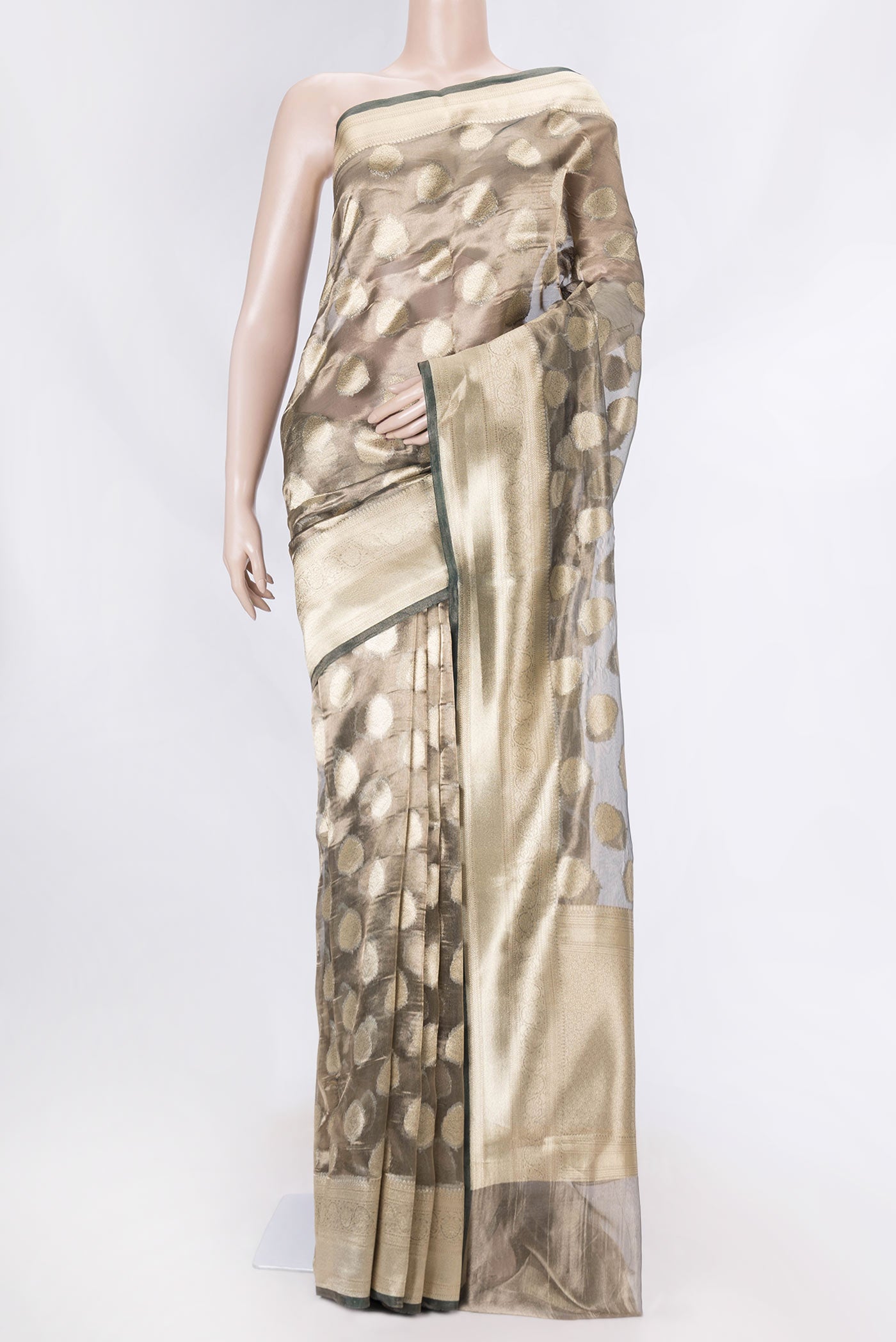 Mehandi Green Dual Tone Organza Silk Saree with Zari Butta on the body and Zari Border displayed on a mannequin