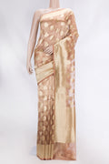 Brown Organza Silk Saree with Zari Butta on the body and Zari Border displayed on a mannequin