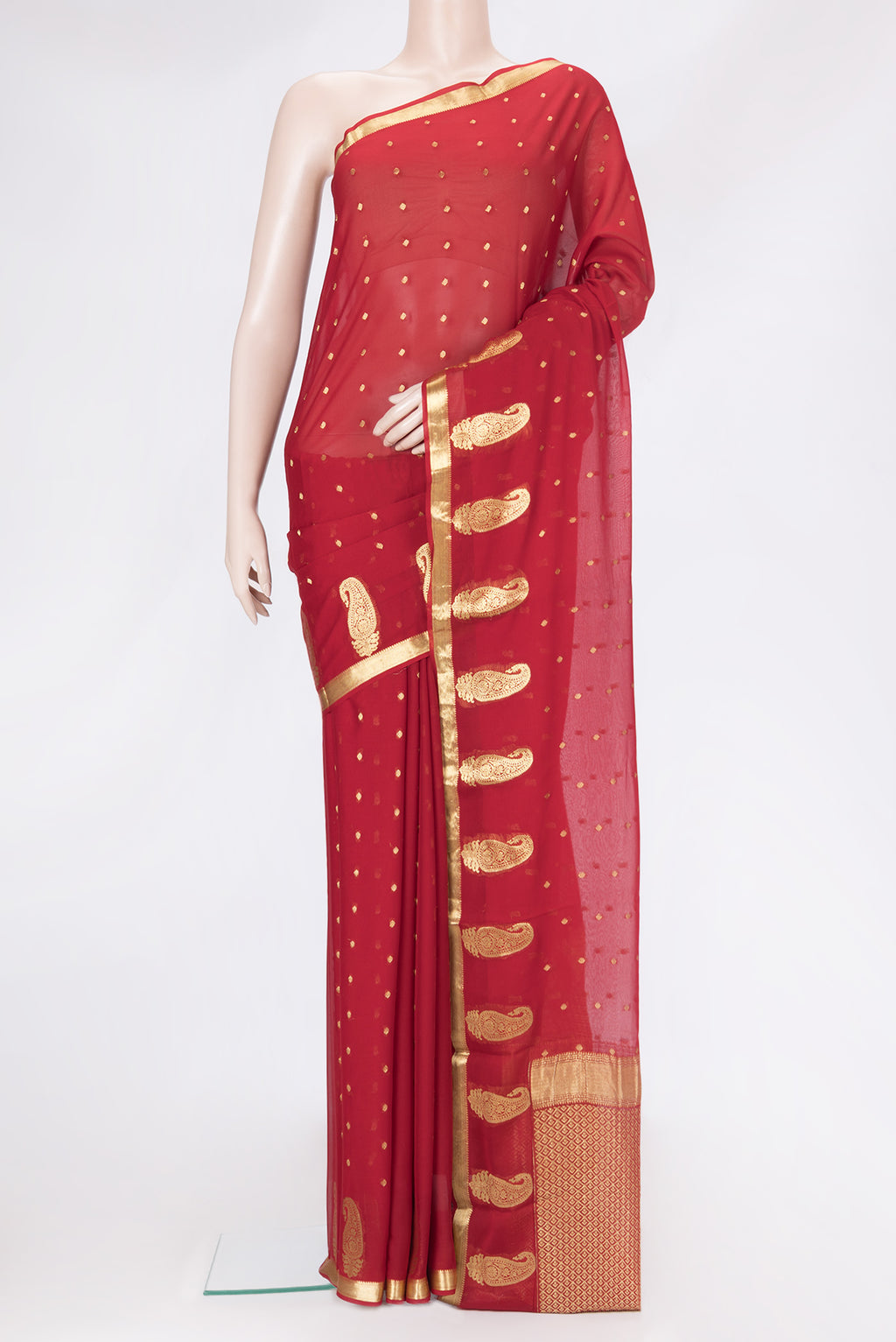 Red Dual Tone Georgette Saree with Zari Butta on the body and Zari Border.  displayed on a mannequin