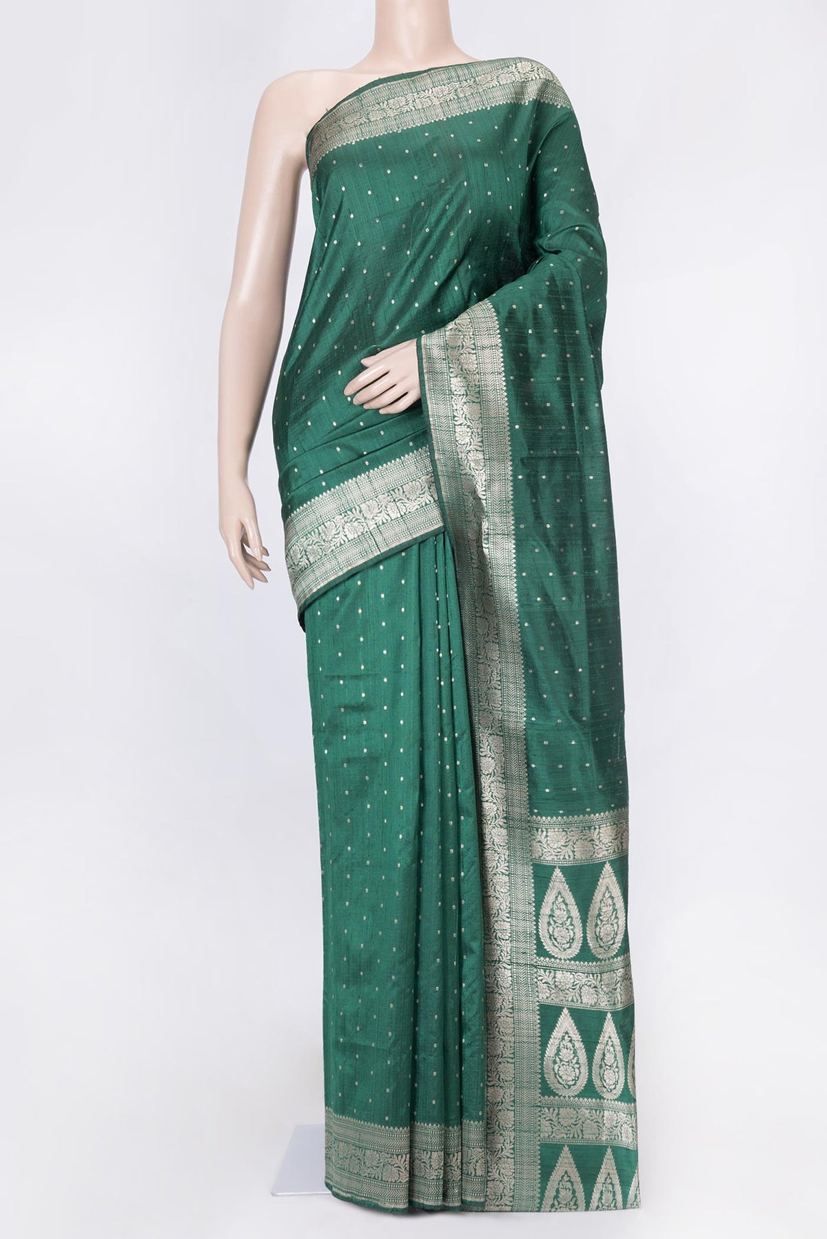 Green Dual Tone Raw Silk Saree with Zari Butta on the body and Zari Border displayed on a mannequin