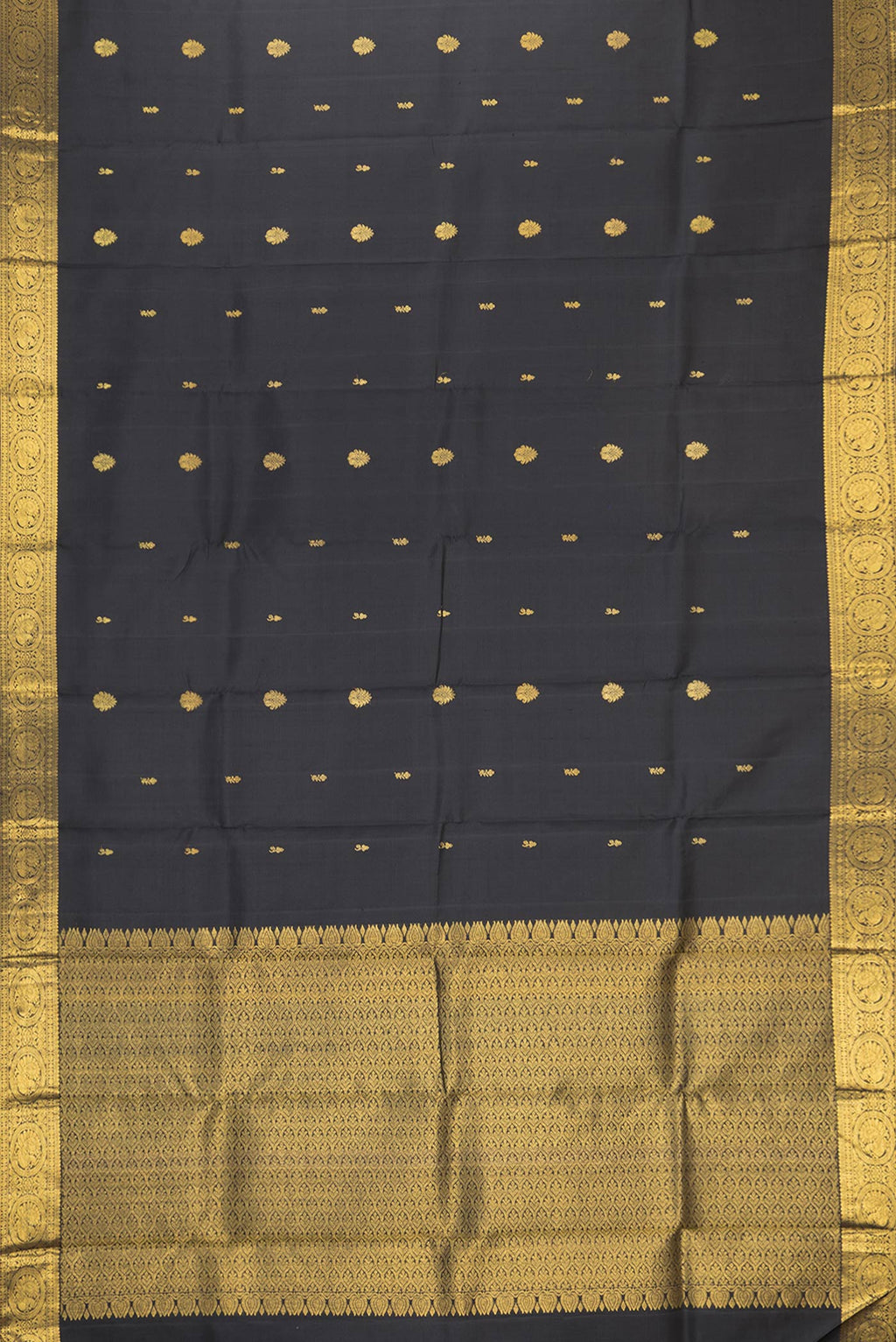 Flat view of Black Dual Tone Kanjivaram Silk Saree with Zari Butta on the body and Zari Border. 