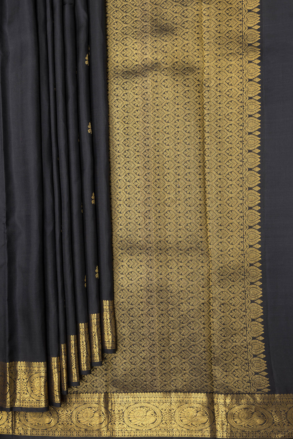 Pleats and pallu of Black Dual Tone Kanjivaram Silk Saree with Zari Butta on the body and Zari Border. 