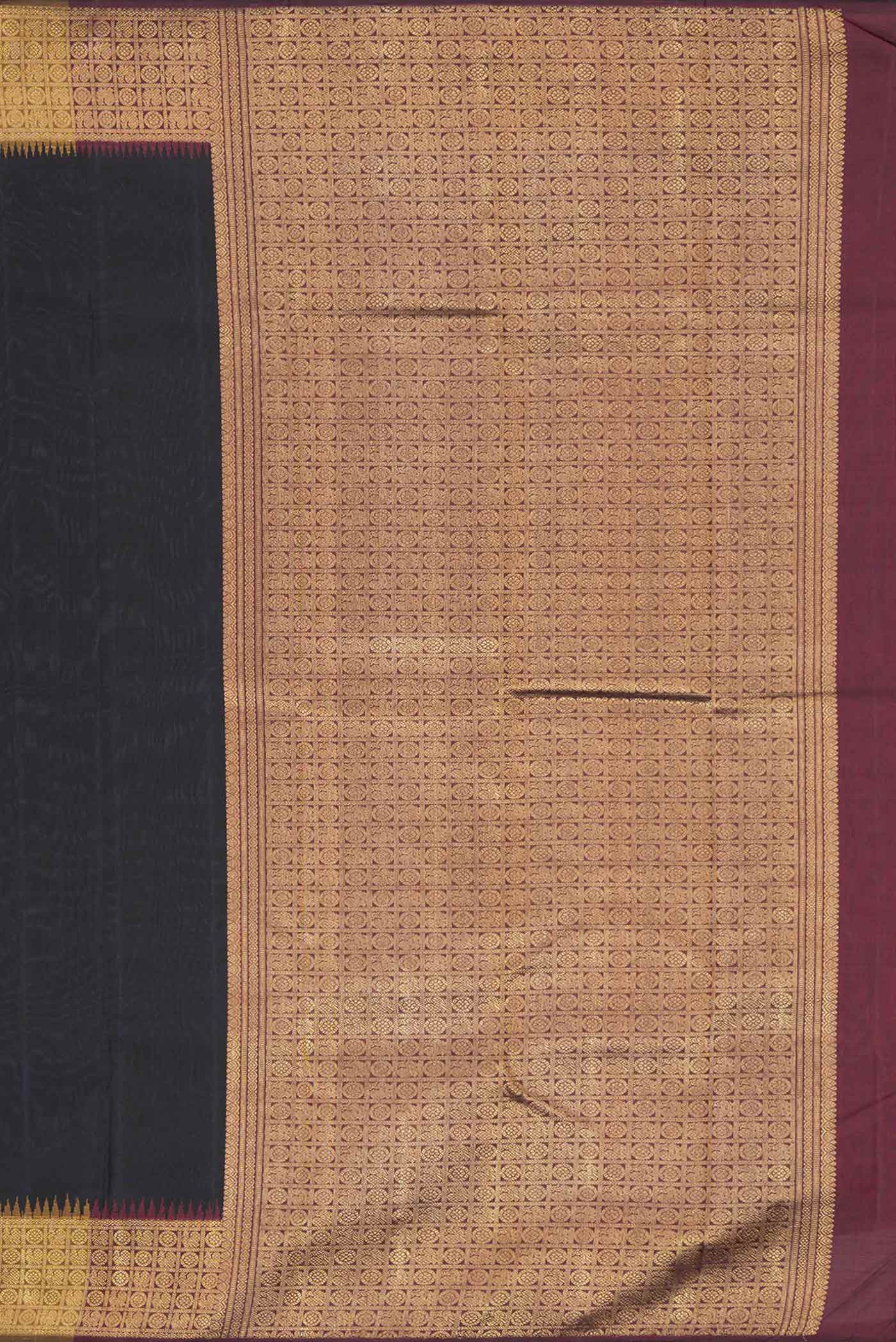 Close up image of the pallu of Pure Silk Pure Zari Black Dual Tone Kanchipuram Saree with Plain Body and Zari Border