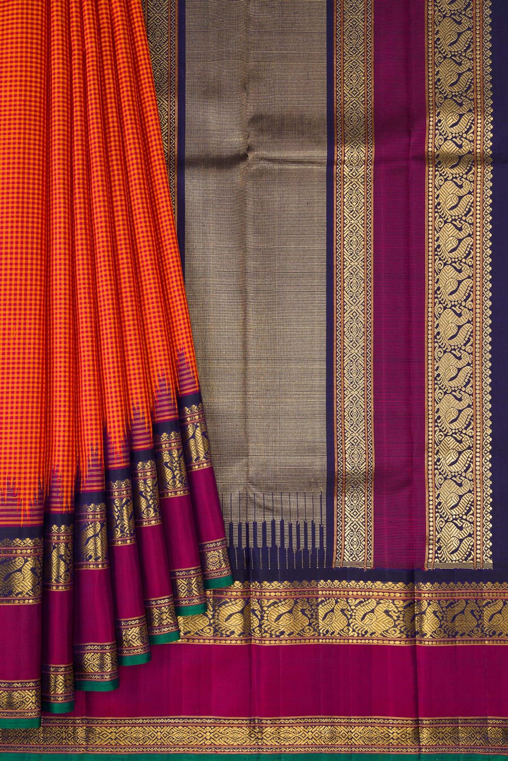 Pleats and pallu of Pure Silk Pure Zari Orange Kanchipuram Saree with Checked design on the body and Temple Border. 