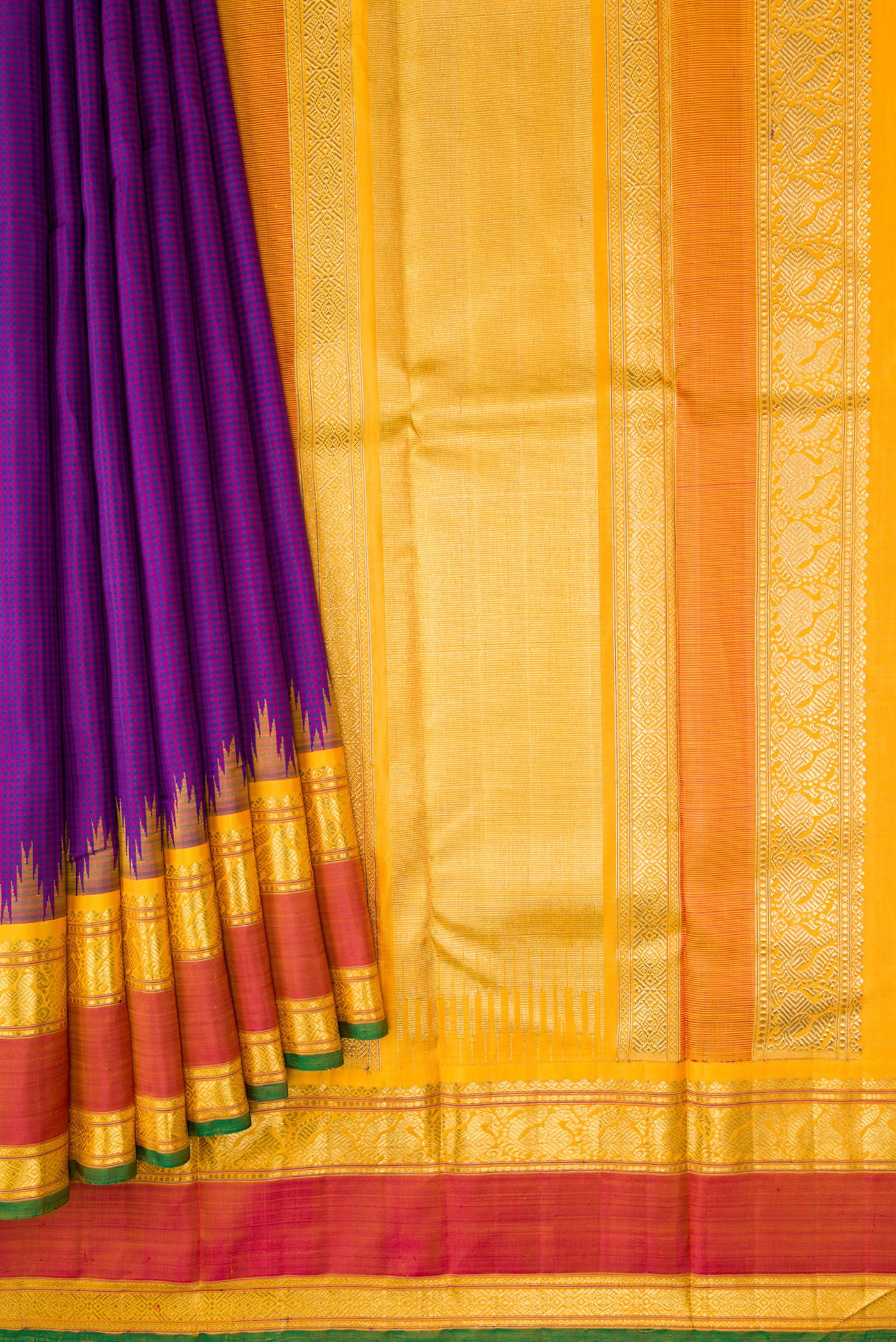 Pleats and pallu of Pure Silk Pure Zari Purple Dual Tone Kanchipuram Saree with Checked design on the body and Temple Border. 
