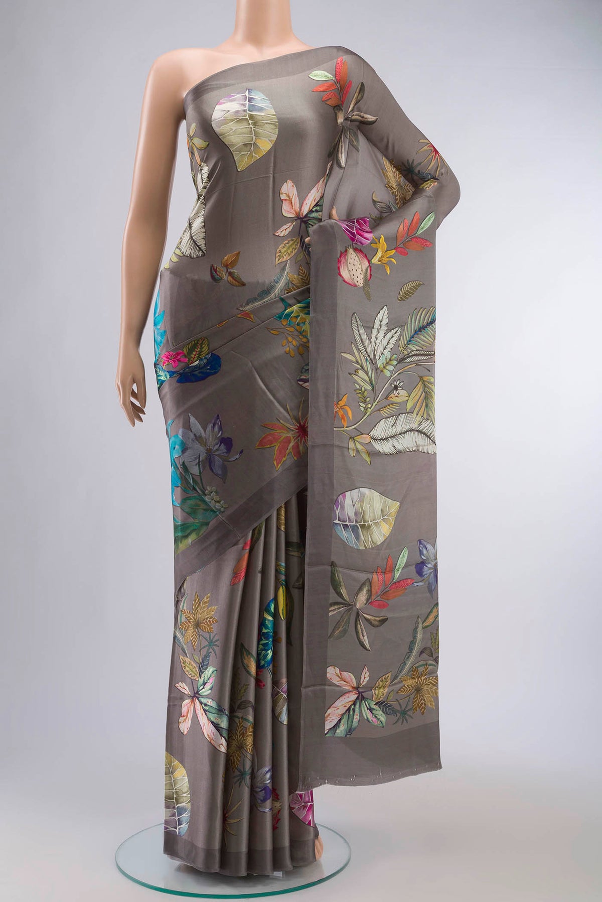 Grey Satin Silk Saree with Floral Print on the body and Without Border displayed on a mannequin