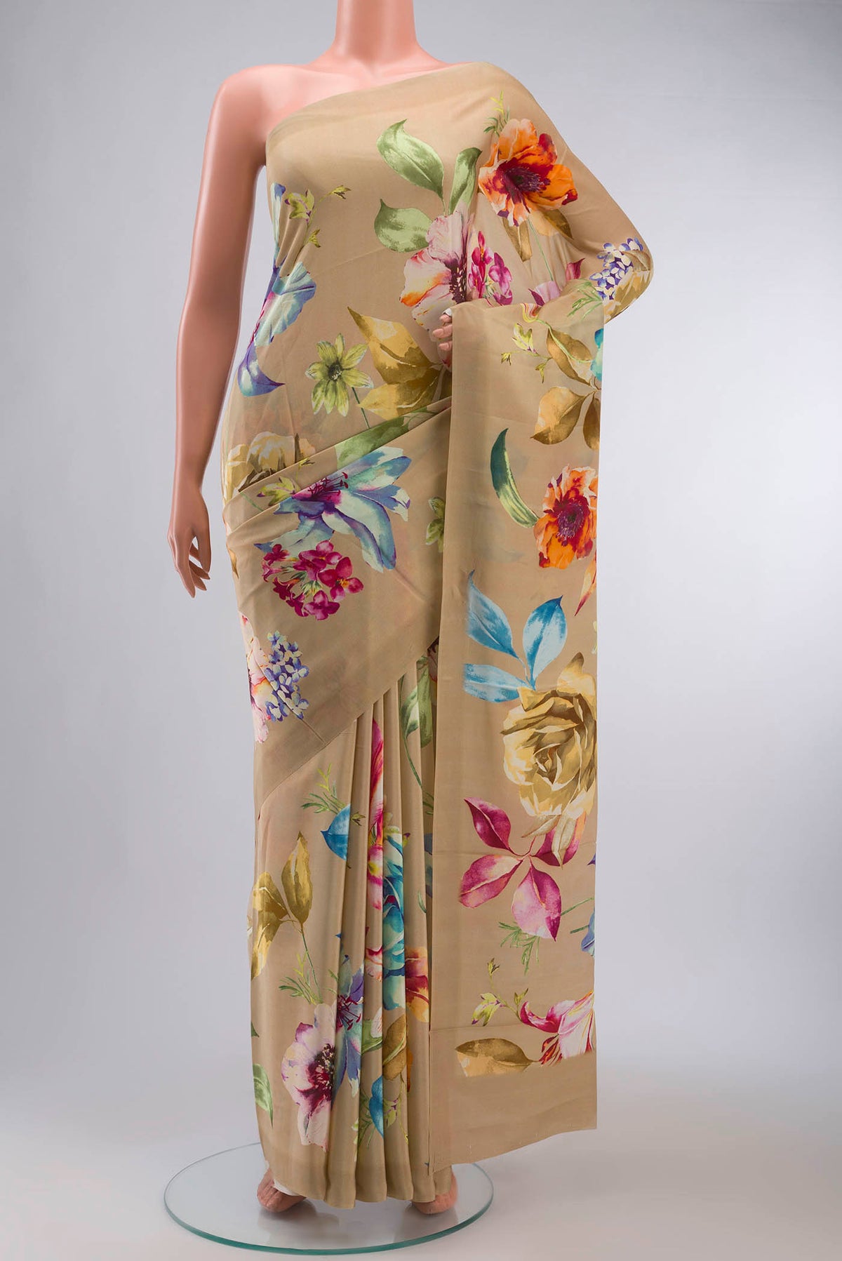 Beige Mysore Crepe Saree with Printed design on the body and Plain Border displayed on a mannequin