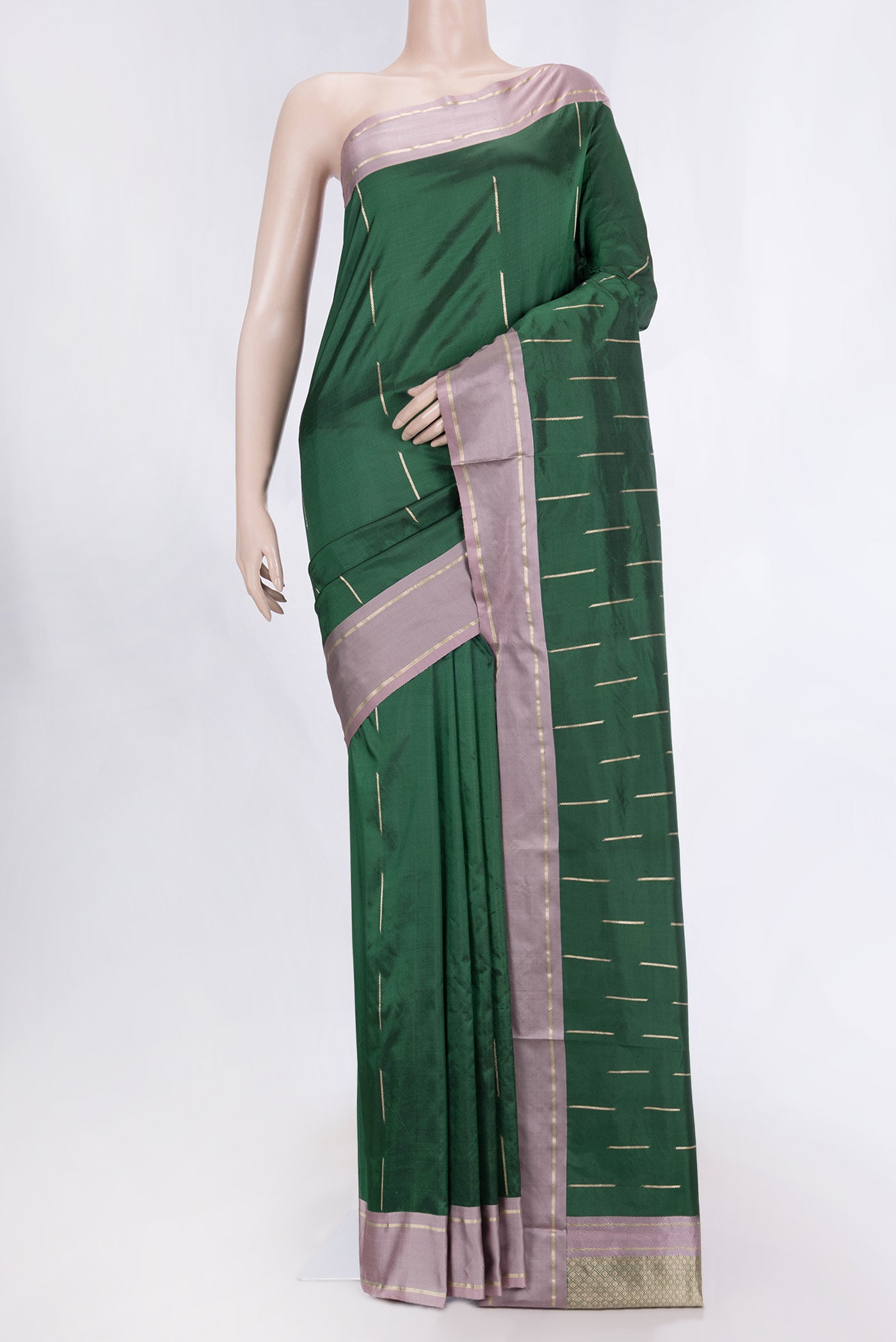 Green Dual Tone Banarasi Silk Saree with Zari Butta on the body and Zari Border displayed on a mannequin
