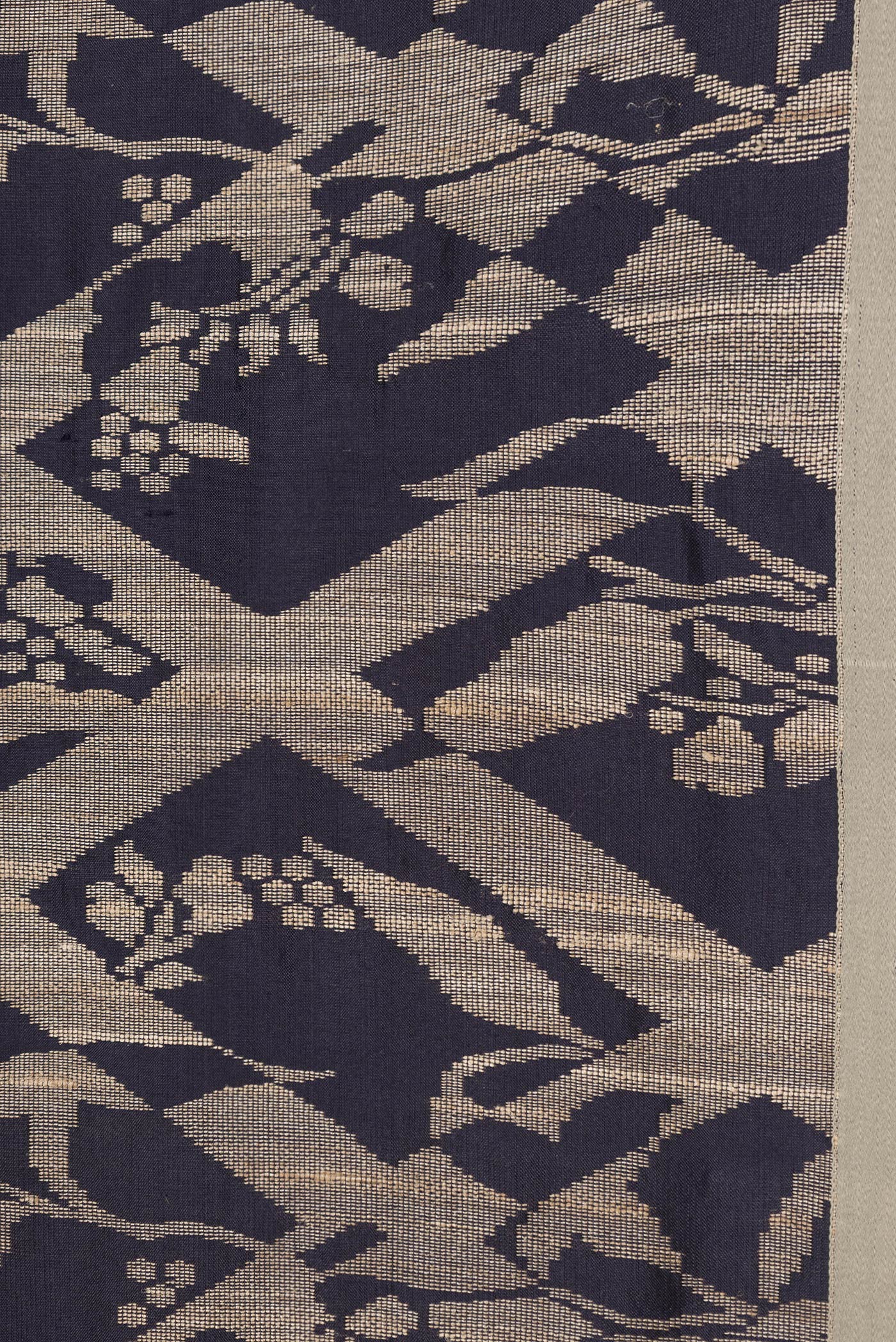 Border image of Navy Blue Dual Tone Tussar Silk Saree with Jacquard design on the body and Plain Border. 