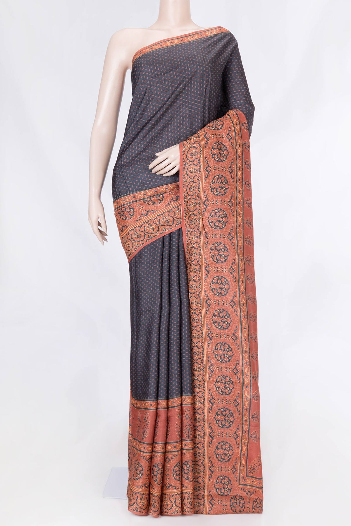 Black Dual Tone Tussar Saree with Bandhani Print on the body and Printed Border displayed on a mannequin