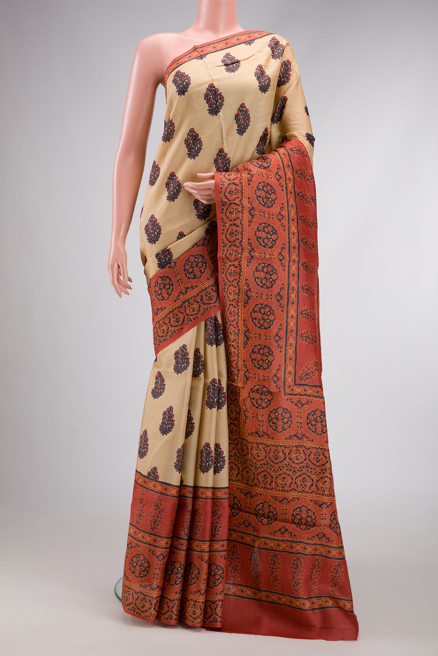 Sandal Dual Tone Tussar Silk Saree with Printed design on the body and Printed Border.  displayed on a mannequin