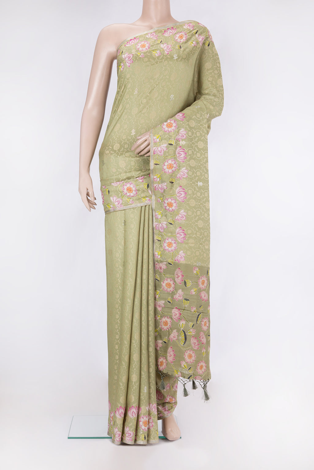 Pista Green Dual Tone Tussar Silk Saree with Jacquard With Zari Butta on the body and Fancy Border.  displayed on a mannequin