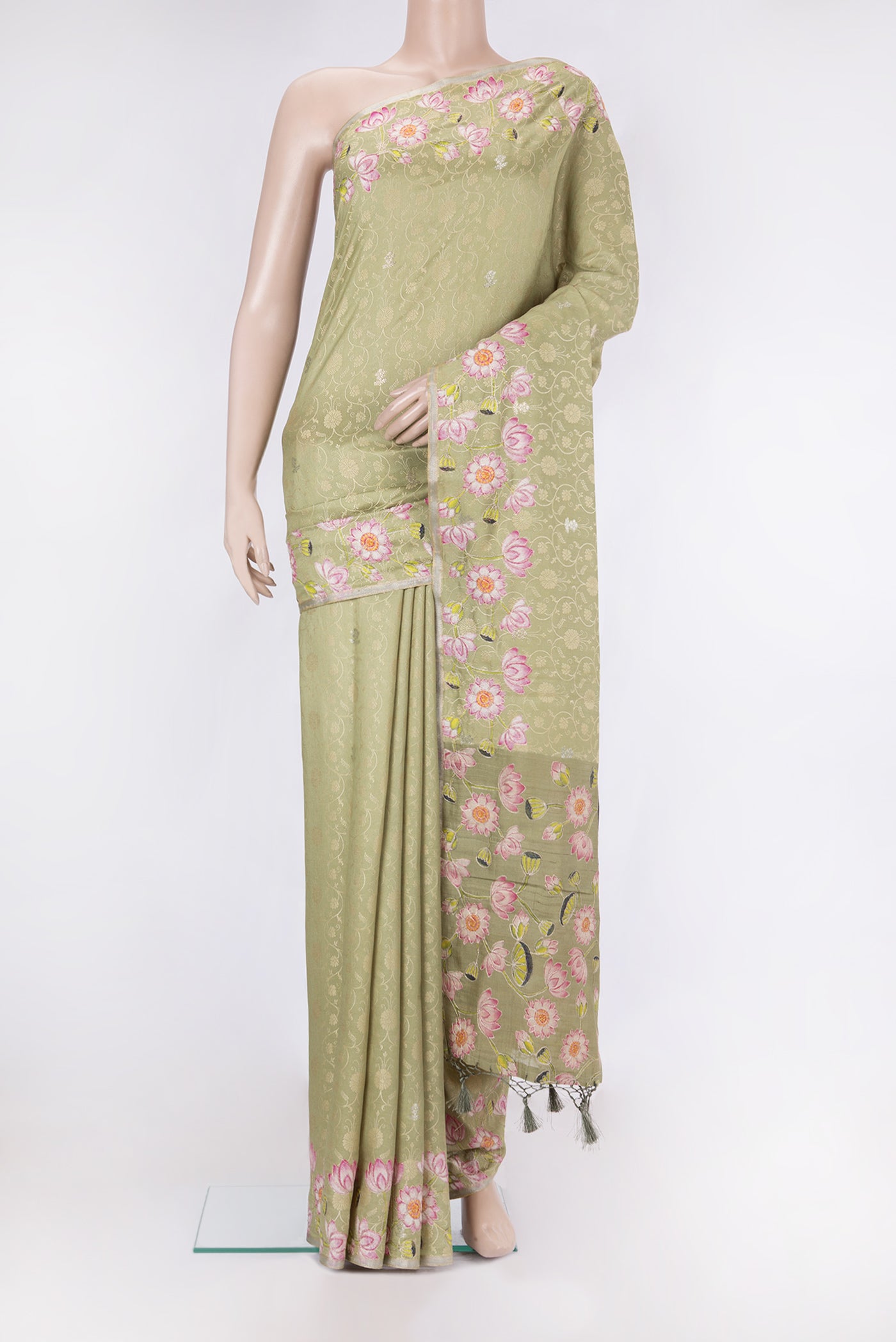 Pista Green Dual Tone Tussar Silk Saree with Jacquard With Zari Butta on the body and Fancy Border.  displayed on a mannequin