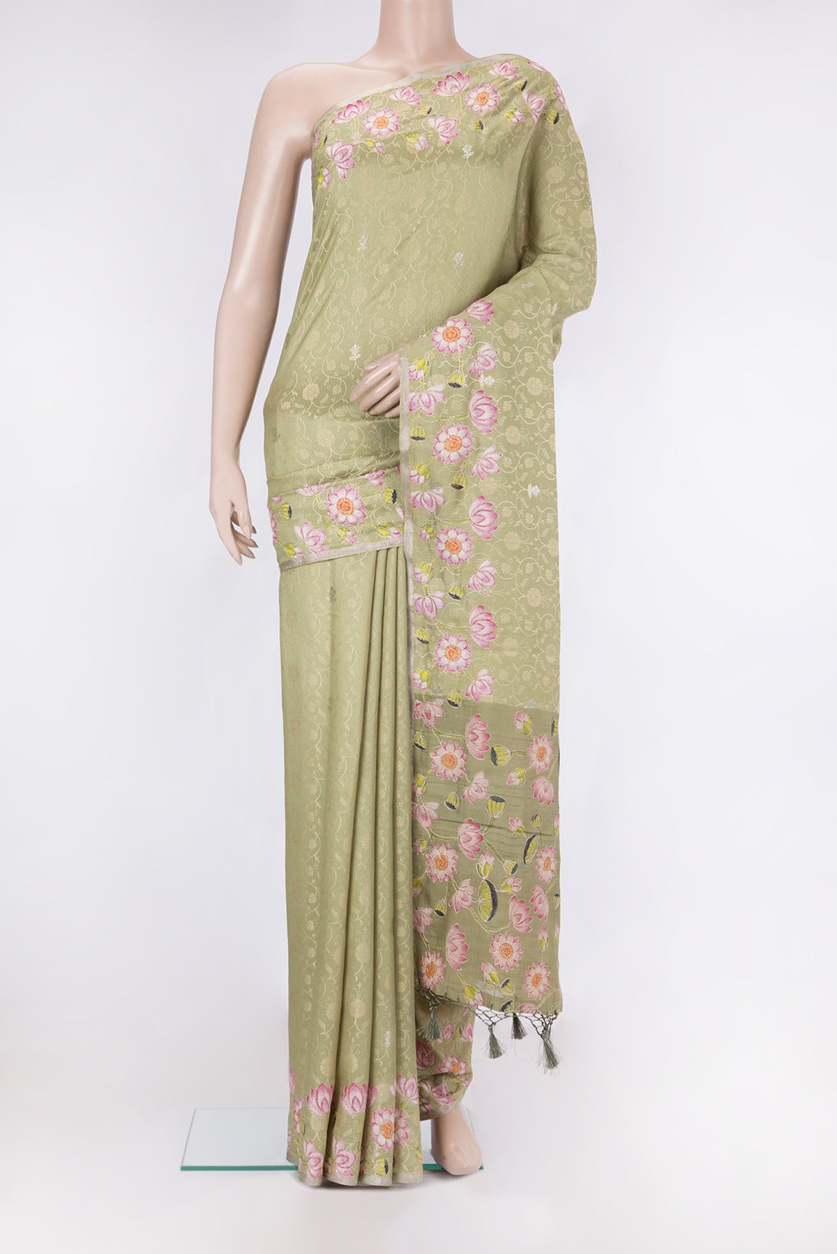 Pista Green Dual Tone Tussar Silk Saree with Jacquard With Zari Butta on the body and Fancy Border.  displayed on a mannequin