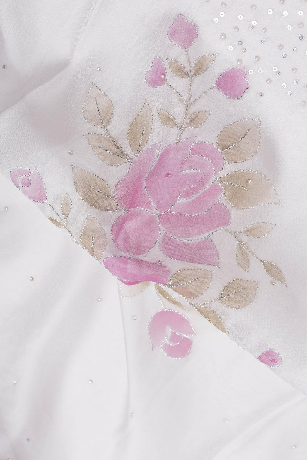 Close up of Grey Dual Tone Georgette Saree with Embroidery on the body and Embroidery Border.  displaying folds