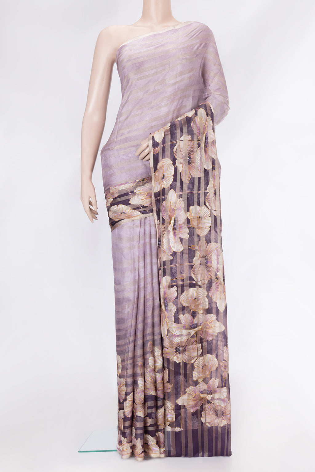 Lavender Dual Tone Tussar Silk Saree with Printed design on the body and Zari Border.  displayed on a mannequin