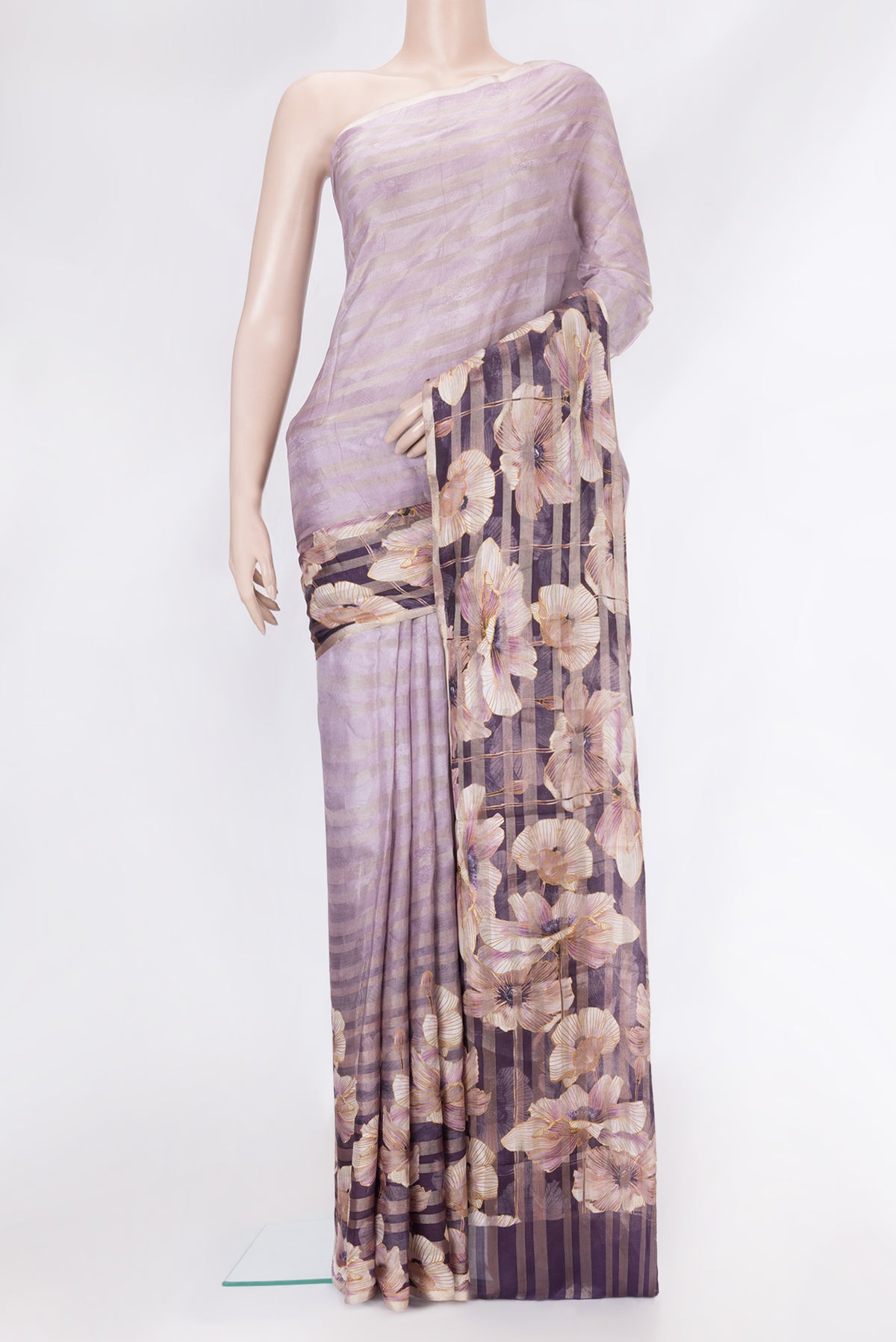 Lavender Dual Tone Tussar Silk Saree with Printed design on the body and Zari Border.  displayed on a mannequin