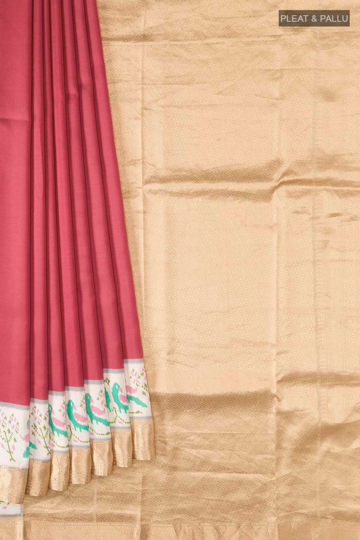 Pleats and pallu of Red Printed Silk Saree with Plain Body and Zari Border