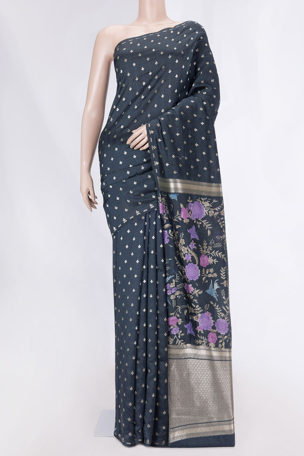 Black Tussar Silk Saree with Zari Butta on the body and Without Border displayed on a mannequin