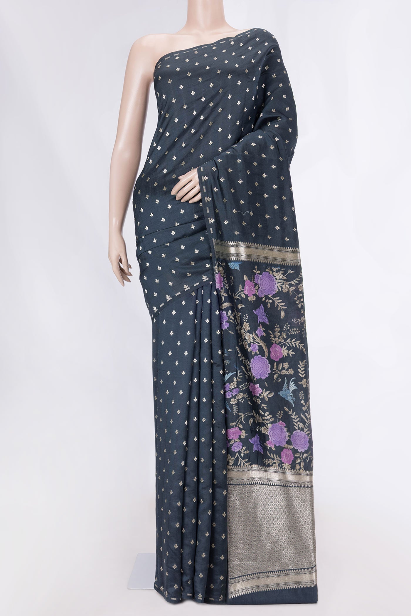 Black Tussar Silk Saree with Zari Butta on the body and Without Border displayed on a mannequin