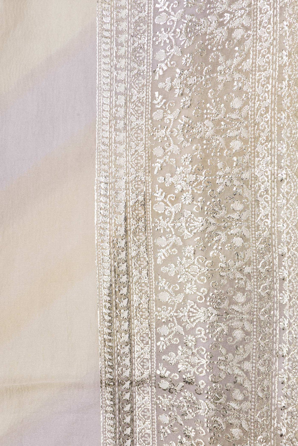 Border image of Sandal Dual Tone Organza Silk Saree with Zari Brocade on the body and Embroidery Border. 