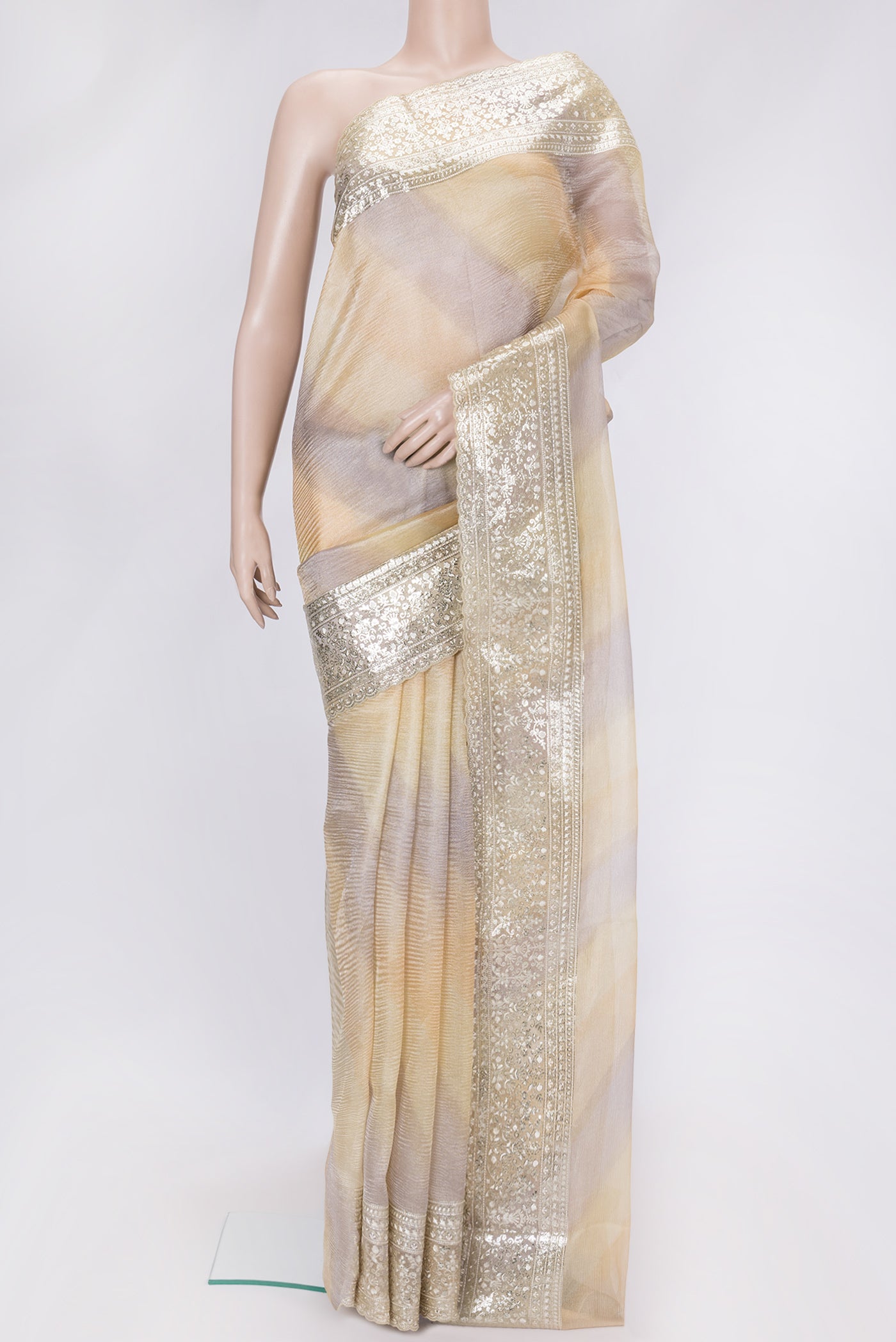 Sandal Dual Tone Organza Silk Saree with Zari Brocade on the body and Embroidery Border.  displayed on a mannequin