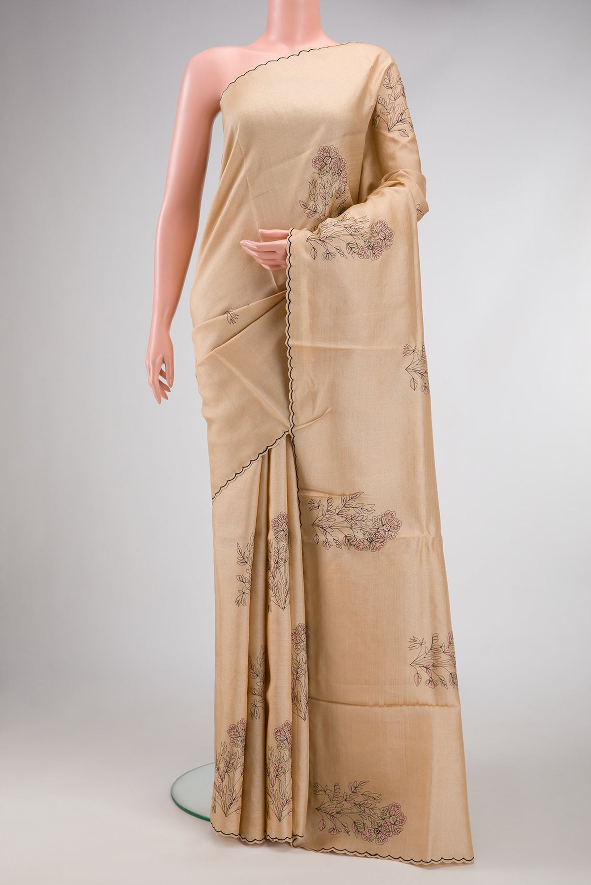 Beige Dual Tone Tussar Silk Saree with Embroidery on the body and Embroidery Border.  displayed on a mannequin