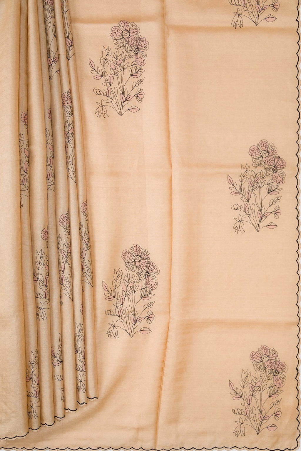 Pleats and pallu of Beige Dual Tone Tussar Silk Saree with Embroidery on the body and Embroidery Border. 