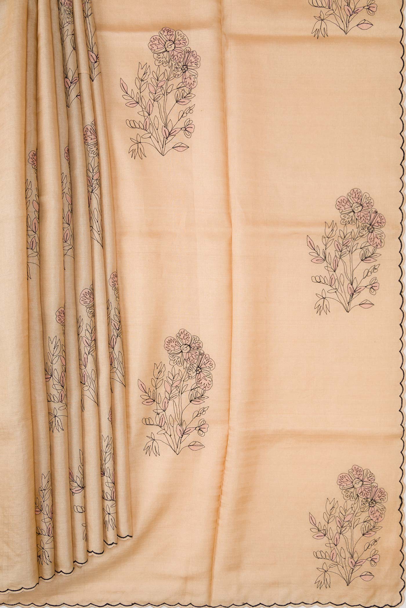 Pleats and pallu of Beige Dual Tone Tussar Silk Saree with Embroidery on the body and Embroidery Border. 