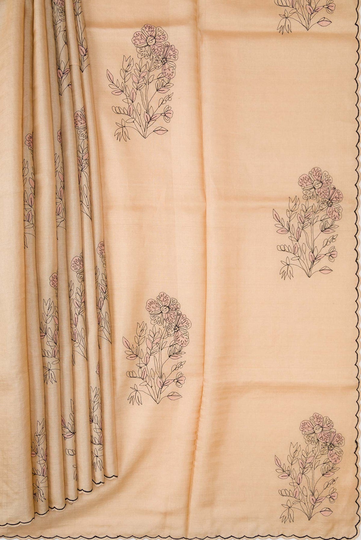 Pleats and pallu of Beige Dual Tone Tussar Silk Saree with Embroidery on the body and Embroidery Border. 