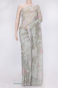 Pista Green Dual Tone Organza Silk Saree with Embroidery on the body and Embroidery Border.  displayed on a mannequin