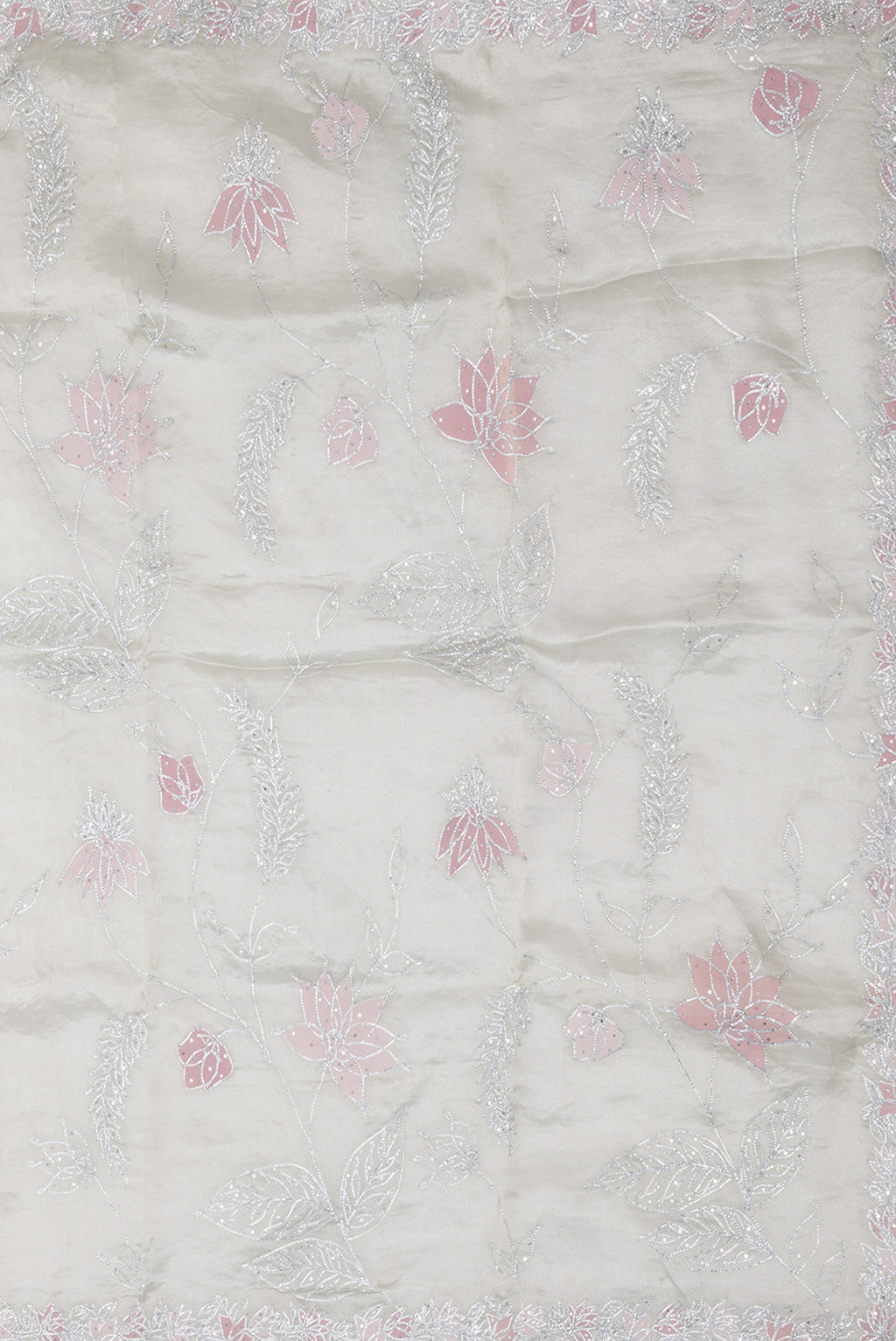 Close up image of the pallu of Pista Green Dual Tone Organza Silk Saree with Embroidery on the body and Embroidery Border. 