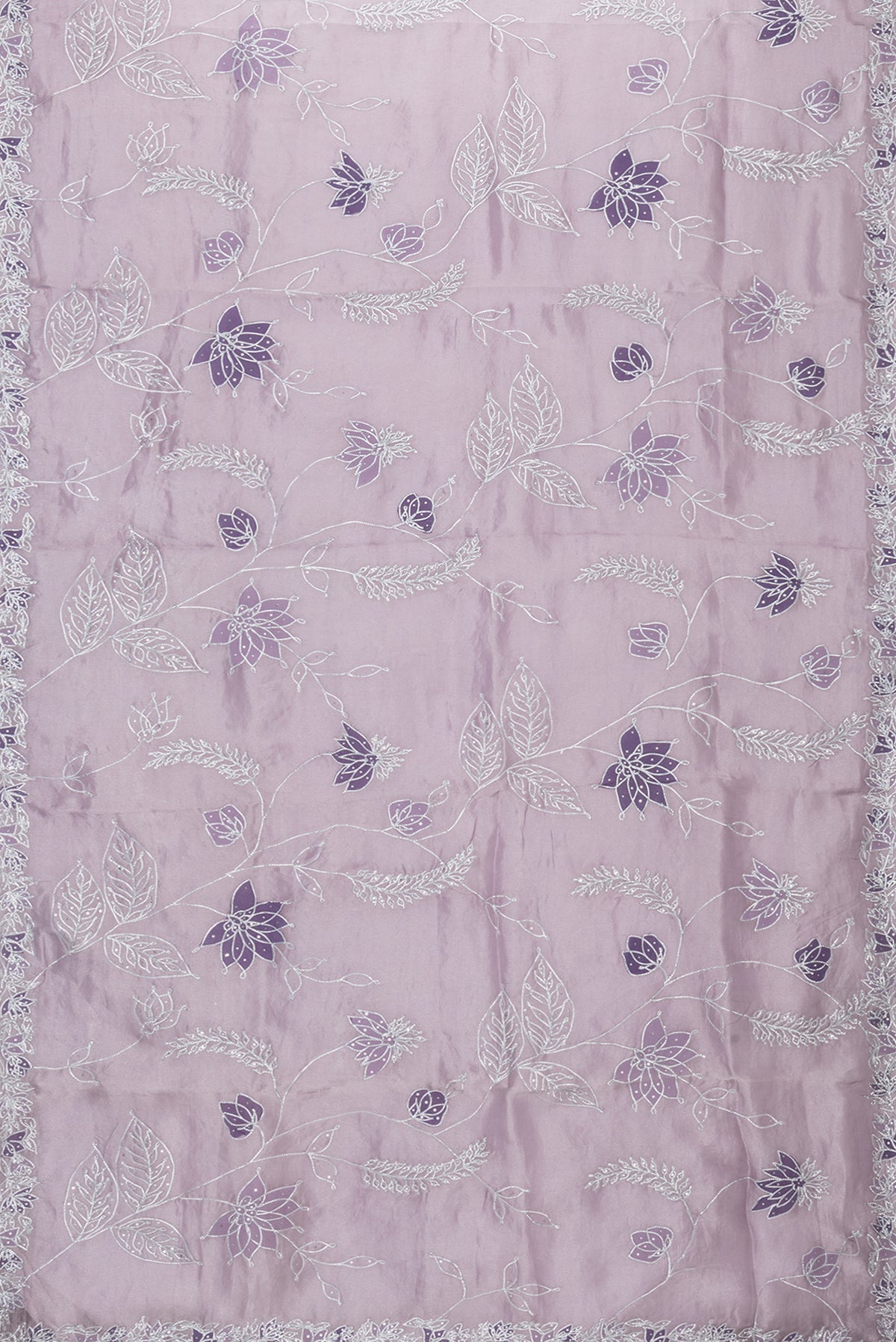 Flat view of Lavender Dual Tone Organza Silk Saree with Embroidery on the body and Embroidery Border. 