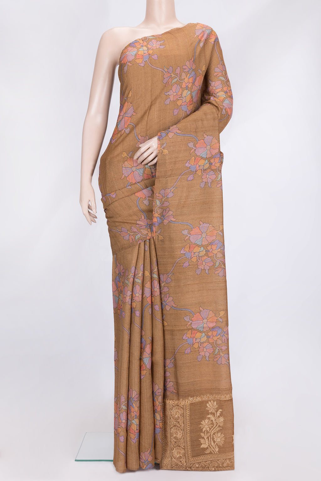 Brown Dual Tone Tussar Silk Saree with Printed design on the body and Zari Border.  displayed on a mannequin