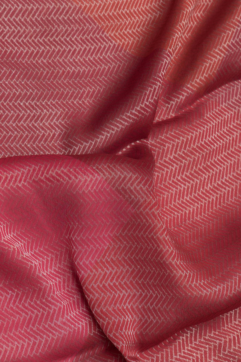 Close up of Red Mysore Crepe Saree with Zari Brocade on the body and Zari Border.  displaying folds